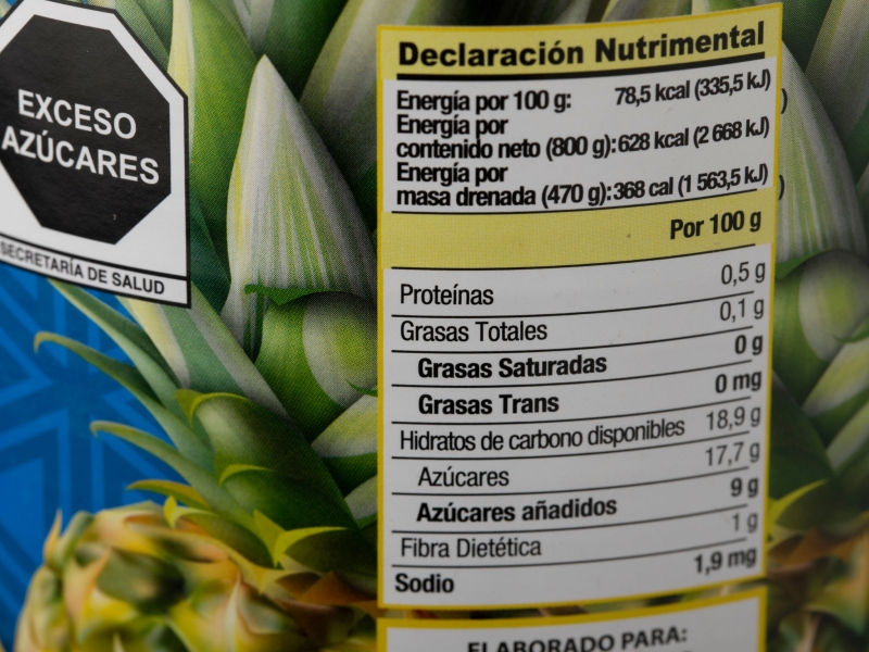 Food label warning about excess added sugars in a can of food